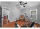 Bonus room with workout equipment, closet, hardwood floors and lots of natural light at 18631 Le Dauphine Pl, Lutz, FL 33558