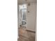 Renovated bathroom with a shower and marble tiles at 2293 Swedish Dr # 11, Clearwater, FL 33763