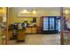 The community's cafe features a small refrigerator, service counter, and beverage station at 2293 Swedish Dr # 11, Clearwater, FL 33763