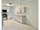 Kitchen featuring stainless steel appliances, ample cabinets and granite countertops at 2293 Swedish Dr # 11, Clearwater, FL 33763