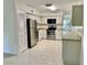 Updated kitchen featuring stainless steel appliances, ample cabinets and neutral countertops at 2293 Swedish Dr # 11, Clearwater, FL 33763