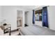Bedroom features a window, closet, and an ensuite bathroom with a pedestal sink at 2916 W Crest Ave, Tampa, FL 33614
