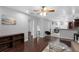 Spacious living room with hardwood flooring, open layout, neutral walls, and modern accents at 2916 W Crest Ave, Tampa, FL 33614