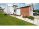 Well-maintained home exterior with lush lawn and tidy landscaping at 3010 Beecher E Dr # A, Palm Harbor, FL 34683