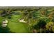 Aerial view of a lush golf course with manicured greens and scenic views at 3010 Beecher E Dr # A, Palm Harbor, FL 34683