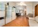 The living room showcases stylish tile floors, a ceiling fan, and flows to other rooms at 3010 Beecher E Dr # A, Palm Harbor, FL 34683