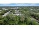 An overhead shot capturing the building nestled among a dense forest at 3038 Eastland Blvd # F102, Clearwater, FL 33761