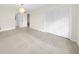 Spacious bedroom with tile floors, closet, and a bright window view at 3038 Eastland Blvd # F102, Clearwater, FL 33761