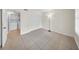 Bedroom with a full closet for storage and ceramic tile at 3038 Eastland Blvd # F102, Clearwater, FL 33761