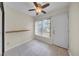 Bright dining area with tile floors, window view, and access to the exterior at 3038 Eastland Blvd # F102, Clearwater, FL 33761