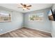 Vacant bedroom showcases light blue walls, wood-look floors, and natural light at 307 Francis Dr, Apollo Beach, FL 33572