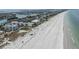 Scenic aerial view of the coastline, showcasing beachfront condos with stunning ocean views at 3200 Gulf Blvd # 202, St Pete Beach, FL 33706