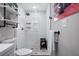 Stylish bathroom featuring a glass shower, modern shelving, and bright fixtures at 3245 Freemont S Ter, St Petersburg, FL 33712
