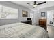 Bright bedroom featuring a ceiling fan, painted walls, and hardwood floors at 3245 Freemont S Ter, St Petersburg, FL 33712