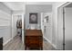 Hallway space with hardwood floors, neutral walls, and access to walk-in closet at 3245 Freemont S Ter, St Petersburg, FL 33712