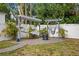 Backyard hammocks nestled in a serene outdoor space with lush greenery, offering ultimate relaxation at 3245 Freemont S Ter, St Petersburg, FL 33712