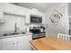 Bright, updated kitchen with stainless appliances, white subway tile, and an inviting island at 3245 Freemont S Ter, St Petersburg, FL 33712
