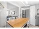 Cozy kitchen offers a glimpse into the living room and features an island with seating at 3245 Freemont S Ter, St Petersburg, FL 33712