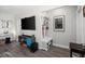 Open-concept living area showcasing modern decor, stylish furnishings, and a mounted television at 3245 Freemont S Ter, St Petersburg, FL 33712