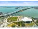 Scenic aerial view of waterfront with marina, bridge, and lush green spaces near the condo and the surrounding area at 331 Cleveland St # 906, Clearwater, FL 33755