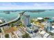 Beautiful aerial view showcasing the city skyline and the condo's prime waterfront location with bridge access at 331 Cleveland St # 906, Clearwater, FL 33755