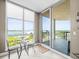 Cozy breakfast nook with large windows offering views of the park and water at 331 Cleveland St # 906, Clearwater, FL 33755