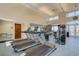 Well-equipped fitness center with treadmills, weight machines, and a view of the outdoors at 331 Cleveland St # 906, Clearwater, FL 33755