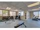 Fitness center with exercise equipment, weights, and natural light for an energizing workout experience at 331 Cleveland St # 906, Clearwater, FL 33755
