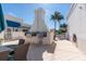 Outdoor grill area equipped with stainless steel grills, prep space, and seating for entertaining at 331 Cleveland St # 906, Clearwater, FL 33755