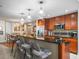 The kitchen has bar seating, pendant lighting, and stainless appliances, making it great for entertaining at 331 Cleveland St # 906, Clearwater, FL 33755