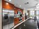 Updated kitchen features stainless appliances, sleek countertops, and ample cabinet space at 331 Cleveland St # 906, Clearwater, FL 33755