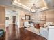 Spacious living room with hardwood floors, stylish furnishings, and elegant lighting at 331 Cleveland St # 906, Clearwater, FL 33755