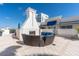 Inviting outdoor fireplace with comfortable seating, perfect for relaxing and enjoying the outdoors at 331 Cleveland St # 906, Clearwater, FL 33755