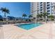 Inviting pool with lounge chairs and covered cabanas, perfect for relaxation and recreation at 331 Cleveland St # 906, Clearwater, FL 33755