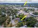 Aerial view of the home's location relative to the hospital, main street, and neighborhood at 351 Hancock St, Dunedin, FL 34698