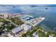 An aerial scene featuring a marina, and a waterfront setting, highlighting recreational opportunities at 351 Hancock St, Dunedin, FL 34698