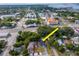 This aerial view highlights the home, neighborhood, and its proximity to the main street at 351 Hancock St, Dunedin, FL 34698