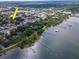 Aerial view of the property location, neighborhood, and proximity to the water at 351 Hancock St, Dunedin, FL 34698