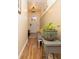 Inviting hallway featuring natural light, clean lines, and a potted plant to add color at 351 Hancock St, Dunedin, FL 34698