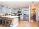 Spacious kitchen with white countertops, light blue cabinets, and stainless steel appliances at 351 Hancock St, Dunedin, FL 34698