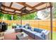 Stylish outdoor patio boasts an extensive seating arrangement, perfect for relaxing or entertaining guests at 351 Hancock St, Dunedin, FL 34698