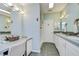 Spacious bathroom with double vanity, walk-in shower and makeup area at 37642 Landis Ave, Zephyrhills, FL 33541