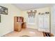 Bright bedroom with a work desk and plenty of natural light for productivity at 37642 Landis Ave, Zephyrhills, FL 33541