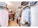 Organized walk-in closet with ample storage space for clothing and accessories at 37642 Landis Ave, Zephyrhills, FL 33541