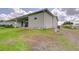 A charming single Gathering home boasting a covered parking area and verdant landscaping at 37642 Landis Ave, Zephyrhills, FL 33541