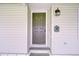 Charming front door with classic hardware and decorative accents at 37642 Landis Ave, Zephyrhills, FL 33541