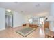 Spacious living room with laminate floors and a view to other rooms at 37642 Landis Ave, Zephyrhills, FL 33541