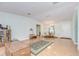 Open living room with laminate flooring and comfortable seating area at 37642 Landis Ave, Zephyrhills, FL 33541