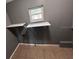 This is a view of the laundry room with added shelf space and tile floors at 37913 Wicklow Ave, Zephyrhills, FL 33541