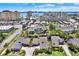 Stunning aerial view of the townhomes with lush landscaping, surrounded by the city and waterfront at 4694 Huron Rd, St Petersburg, FL 33708
